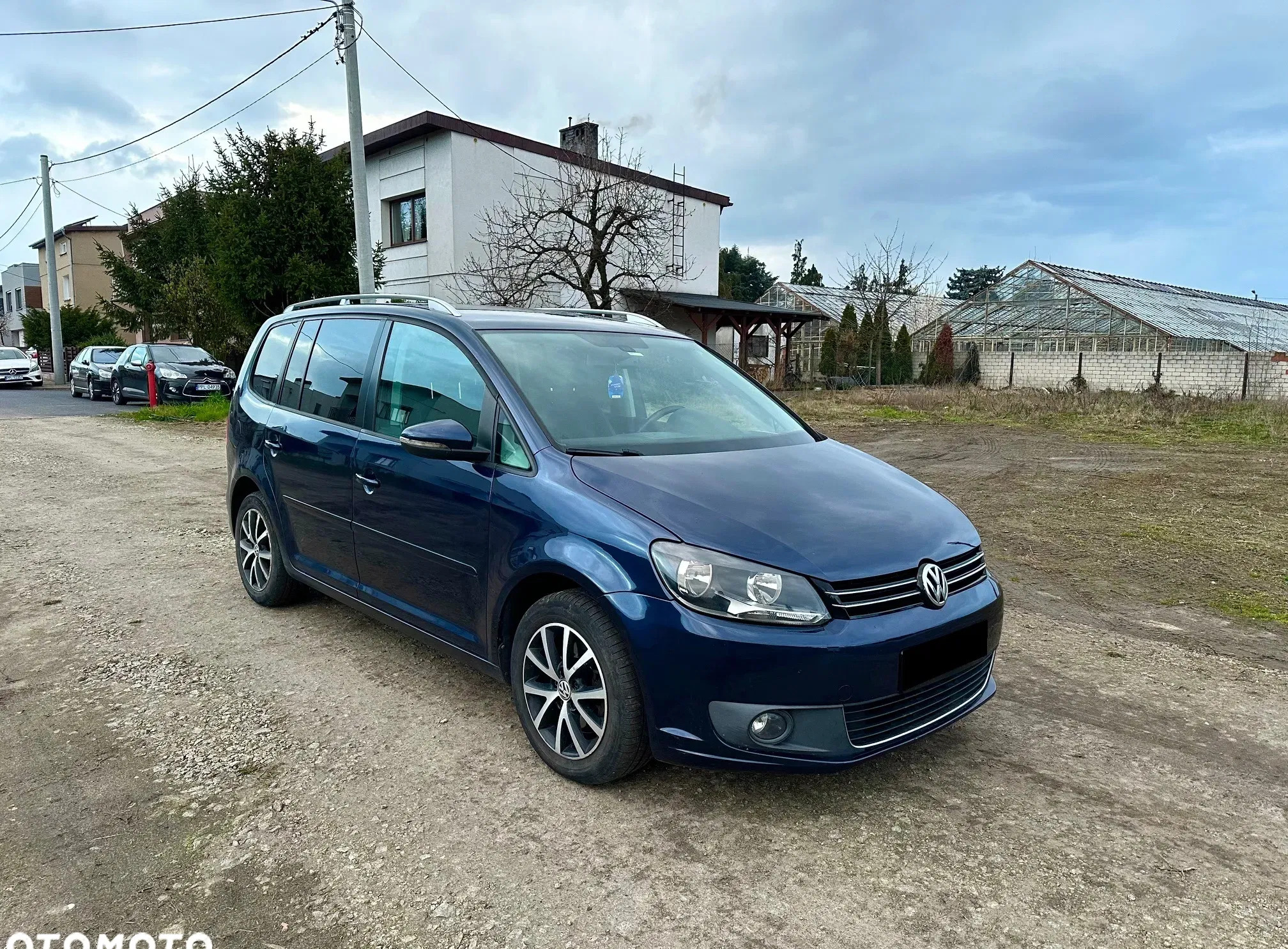 samochody osobowe Volkswagen Touran cena 36500 przebieg: 176000, rok produkcji 2011 z Pleszew